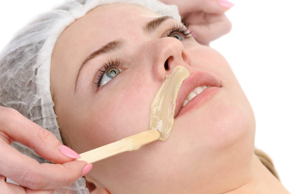 A Lady getting waxing on upper lips | Get Waxing and Threading at Flutter and Wink in Vancouver, Washington